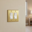 Deco 2-gang rocker switch plate in Brushed Brass, photo 2 - lifestyle