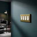 Deco 4-gang rocker switch plate in Brushed Brass, photo 2 - lifestyle