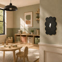 Scallop 1G Toggle Wall Plate in Black in a playroom