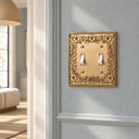 Botanical Garden 2G Toggle Wall Plate in Brushed Gold in a hallway