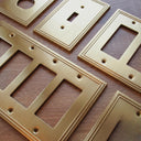 Imperial 2G Toggle Wall Plate | Brushed Gold - close-up detail
