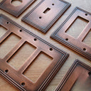Imperial 2G Toggle Wall Plate | Vintage Copper - close-up detail