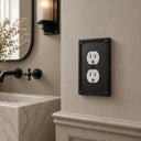 Pearl 1-gang duplex wall plate in Black, lifestyle photo