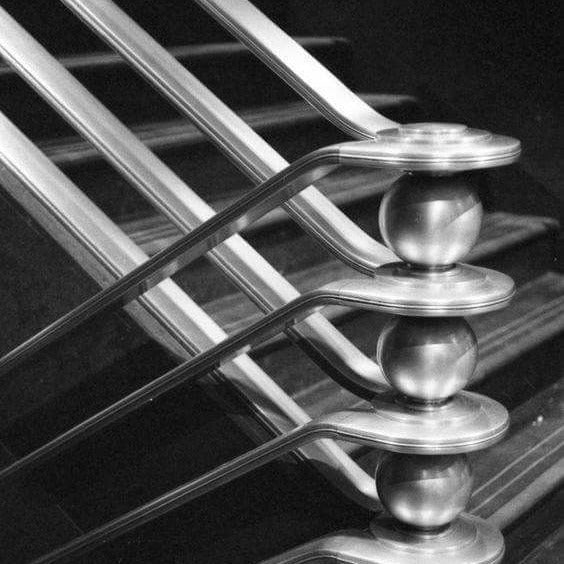 Black and white chrome stair rail