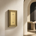 Estate 1G Blank wall plate in Brushed Gold on a wall in a styled room
