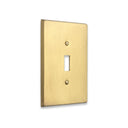 Forge 1G Toggle wall plate in Brushed Gold, angled view