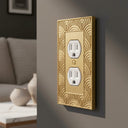 Gatsby 1G Duplex Wall Plate in Brushed Gold in a living room