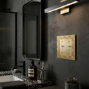 Gatsby 2G Toggle Wall Plate in Brushed Gold in a bathroom