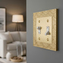 Gatsby 2G Toggle Wall Plate in Brushed Gold in a living room