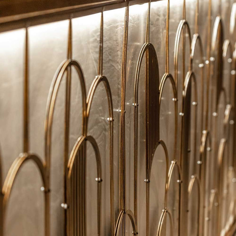 Gold arched wall panels