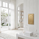 Heritage 1G Blank wall plate in Brushed Gold on a wall in a styled room