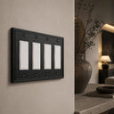 Imperial 4G Rocker wall plate in Black on a wall in a styled room