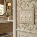 Laurel 3G Toggle wall plate in Warm Ivory on a wall in a styled room