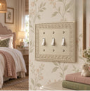 Laurel 3G Toggle wall plate in Warm Ivory on a wall in a styled room