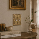 Nouveau 2G Toggle Wall Plate in Brushed Gold in a living room