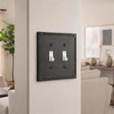 Pearl 2-gang toggle wall plate in Black, lifestyle photo