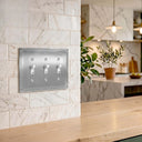 Pearl 3-gang toggle wall plate in Brushed Nickel, lifestyle photo