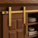 Mini sliding barn door hardware kit in gold on a walnut sideboard door