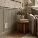 Scallop 1G Duplex Wall Plate in Warm Ivory in a living room