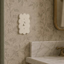 Scallop 1G Toggle Wall Plate in Warm Ivory in a bathroom