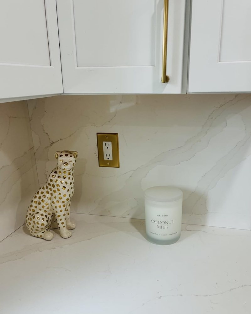Customer photo: gold rocker outlet marble backsplash