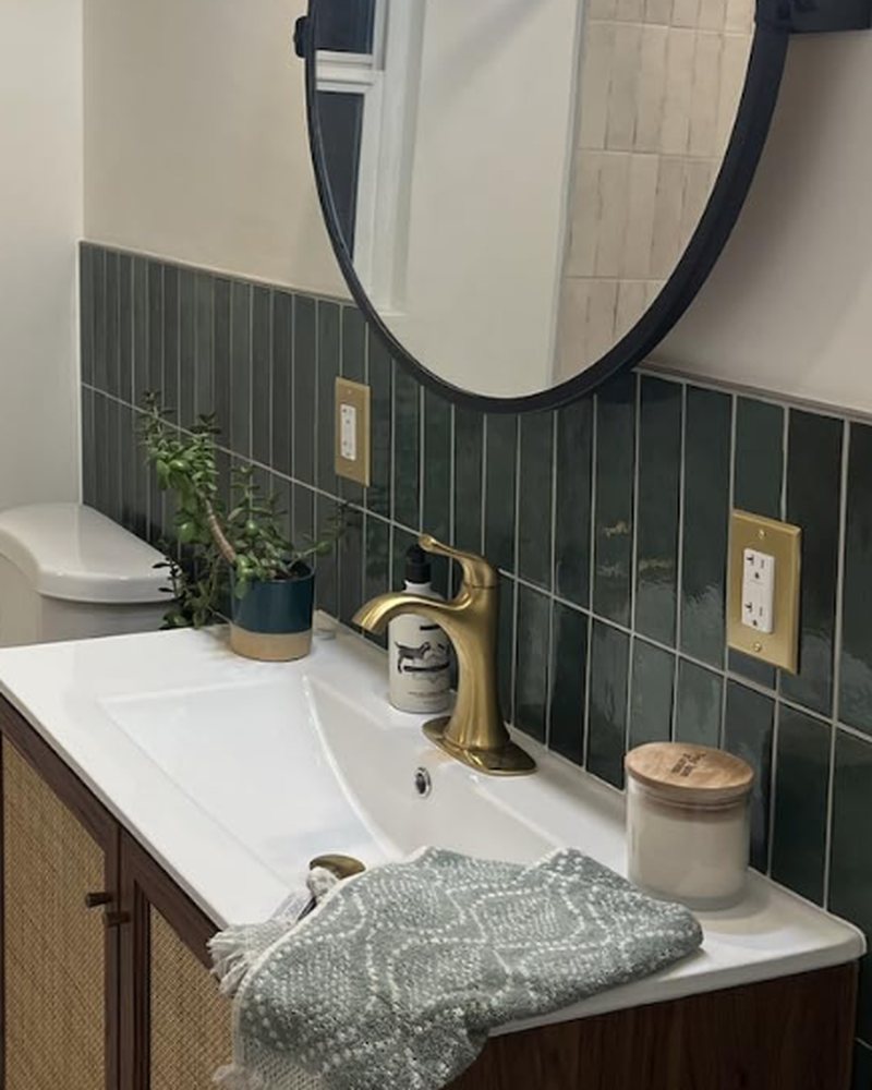 Customer photo: gold rocker outlets green tile bath